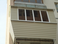 наружная обшивка балкона сайдингом